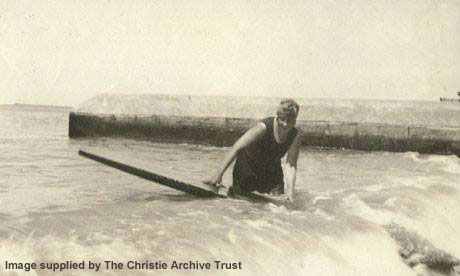 Agatha on a surfboard